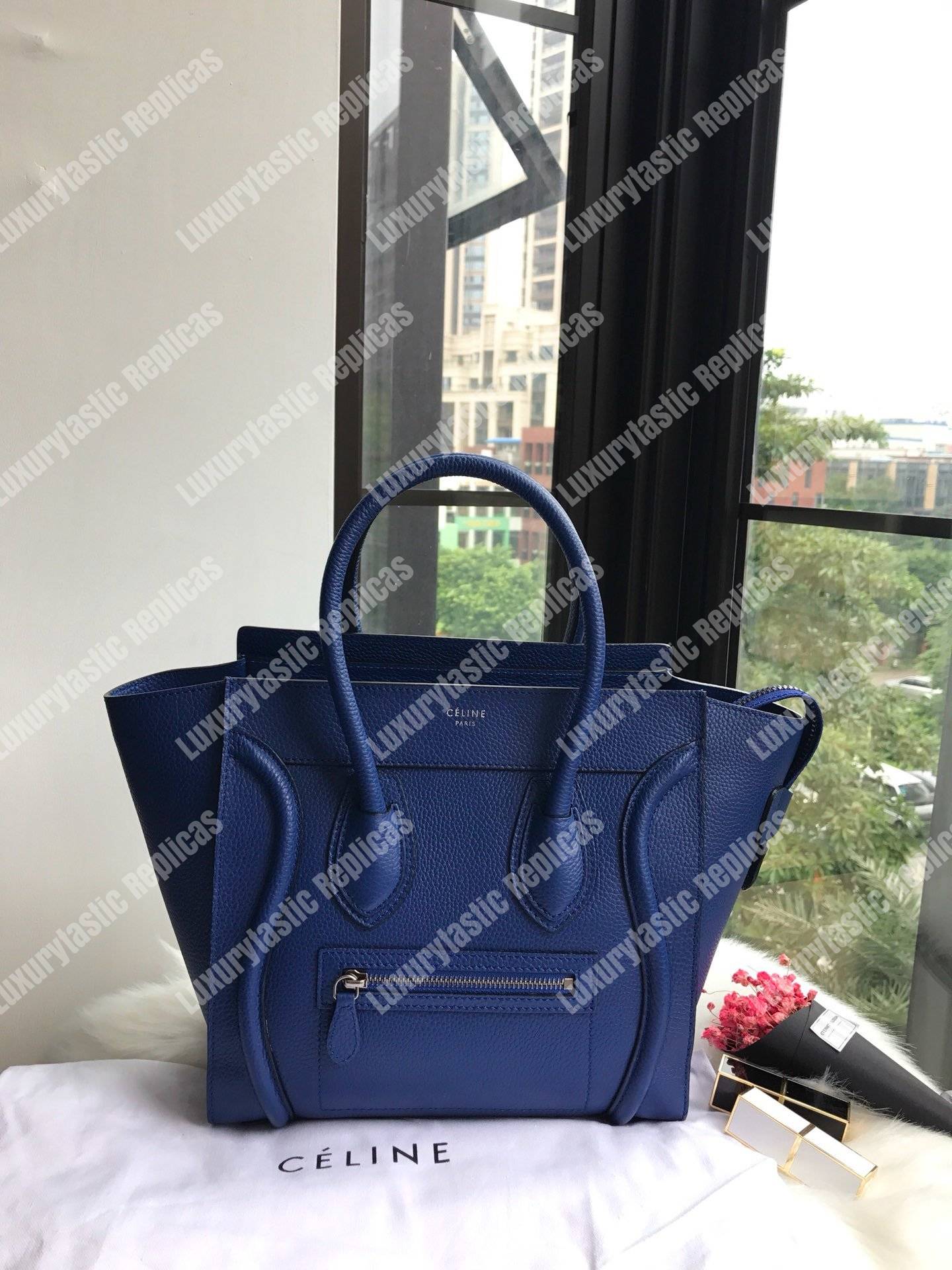 Ce**e micro luggage handbag in drummed calfskin petrol