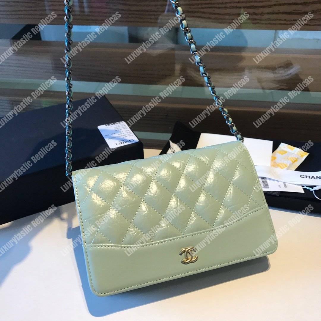 Ch*el wallet on chain – woc aged & smooth calfskin light blue