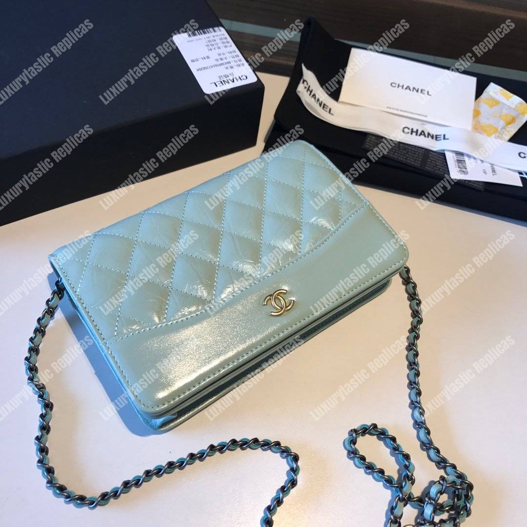 Ch*el wallet on chain – woc aged & smooth calfskin light blue