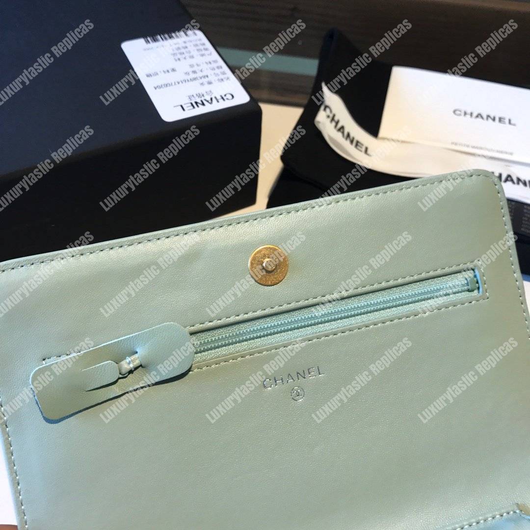 Ch*el wallet on chain – woc aged & smooth calfskin light blue