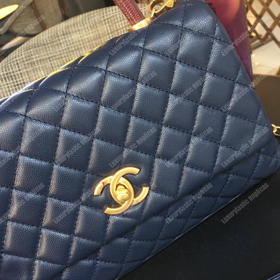 Ch*el flap bag with top handle navy blue