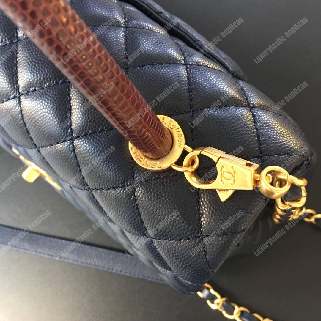 Ch*el flap bag with top handle navy blue
