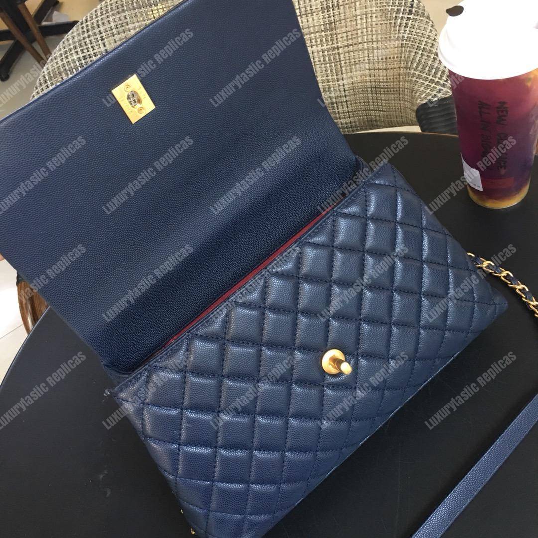 Ch*el flap bag with top handle navy blue