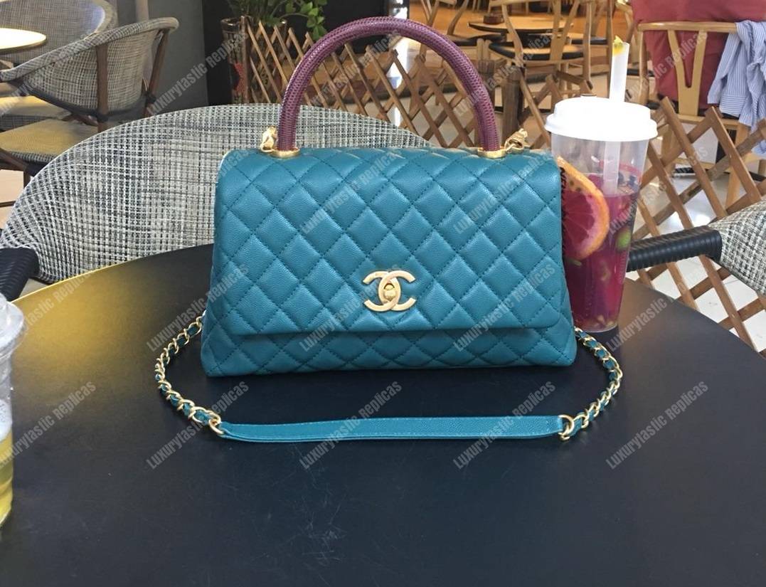 Ch*el flap bag with top handle blue