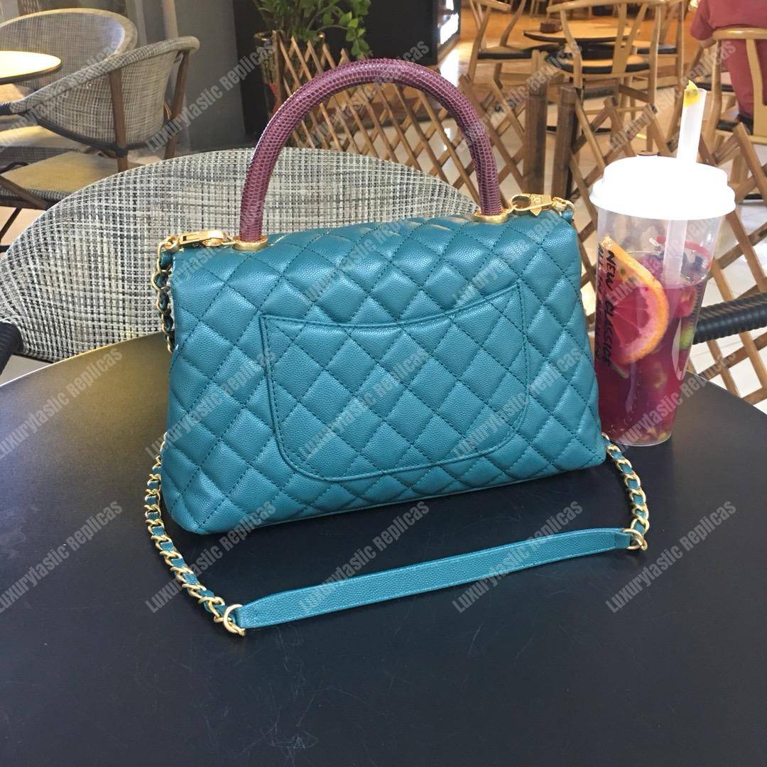 Ch*el flap bag with top handle blue