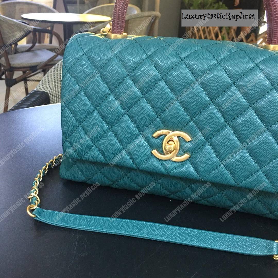 Ch*el flap bag with top handle blue