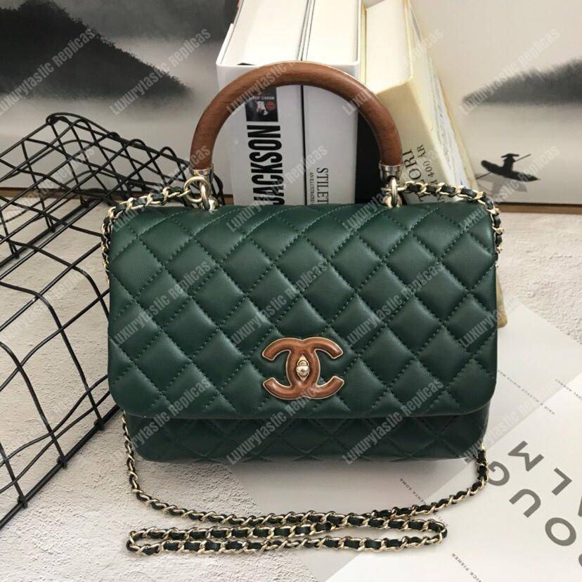 Ch*el flap bag with top handle green