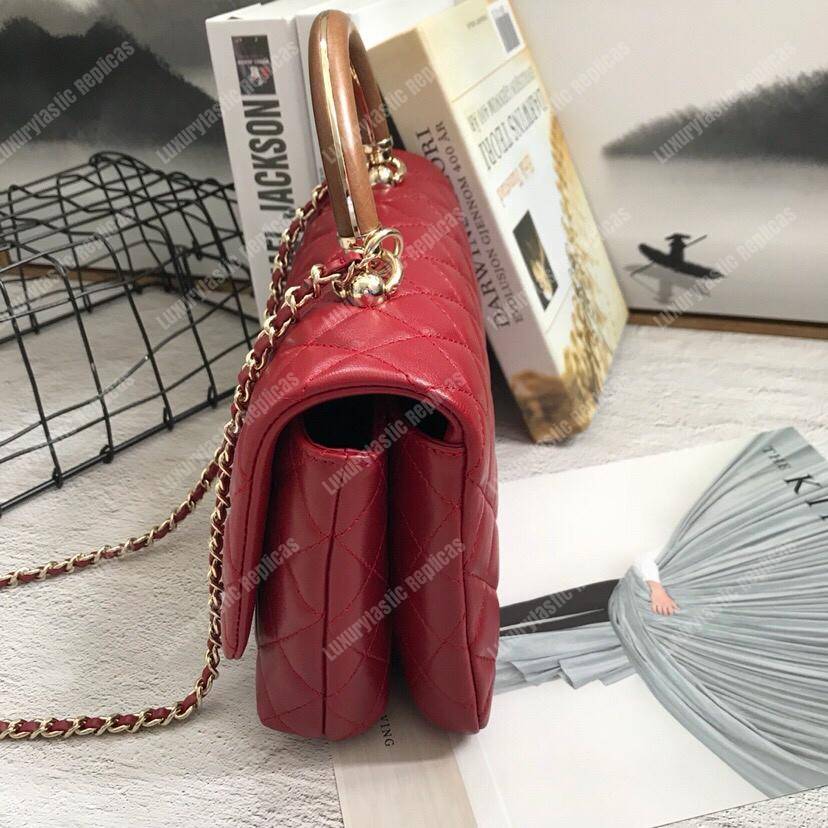 Ch*el flap bag with top handle red