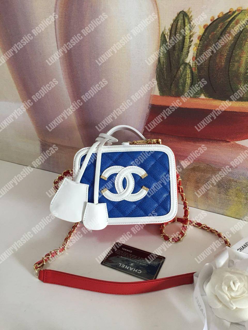 Ch*el small vanity case dark blue