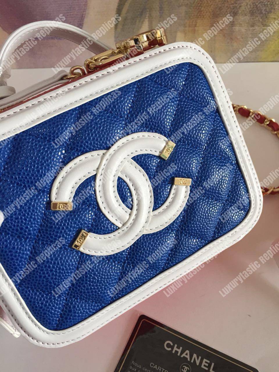 Ch*el small vanity case dark blue