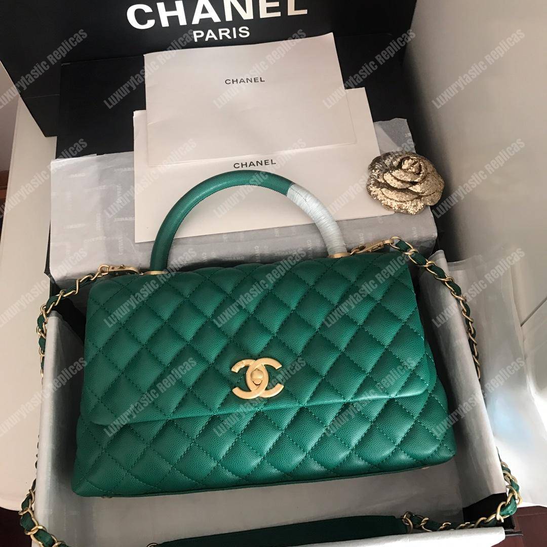 Ch*el flap bag with top handle green
