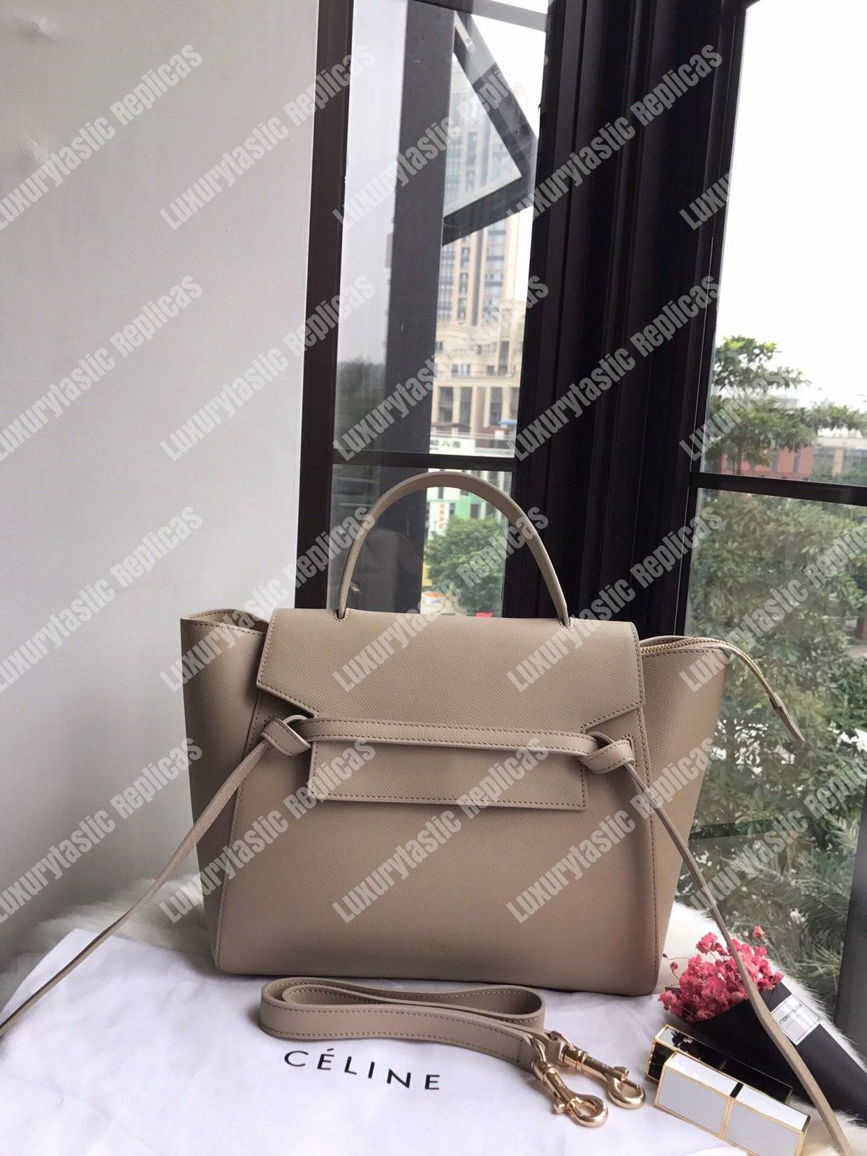 Ce**e mini belt bag in grained calfskin light taupe