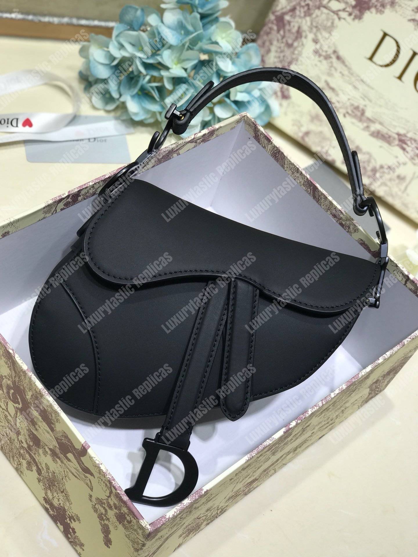 D*or saddle bag in matte black calfskin