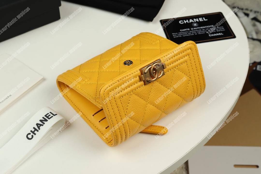 Ch*el boy small flap wallet yellow