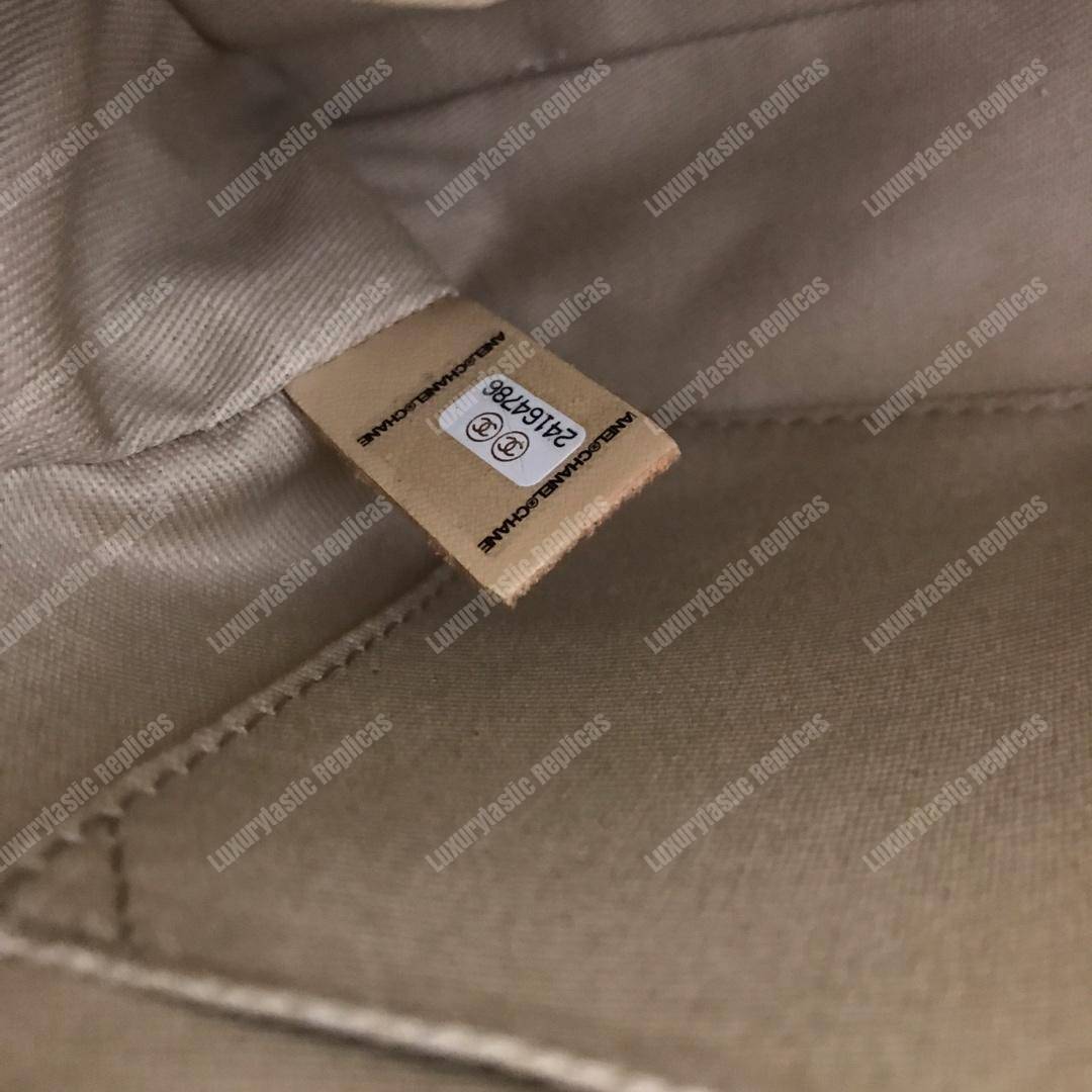 Ch*el flap bag with top handle beige
