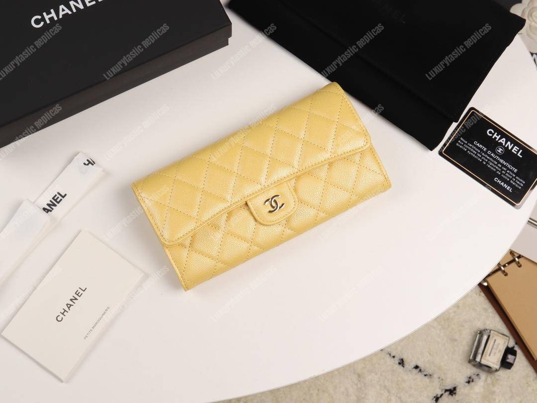 Ch*el classic long flap wallet yellow