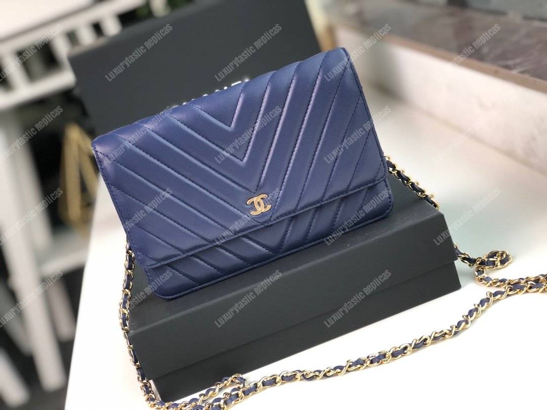 Ch*el wallet on chain – woc chevron lambskin dark blue gold-toned