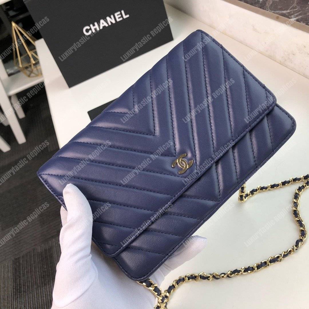 Ch*el wallet on chain – woc chevron lambskin dark blue gold-toned