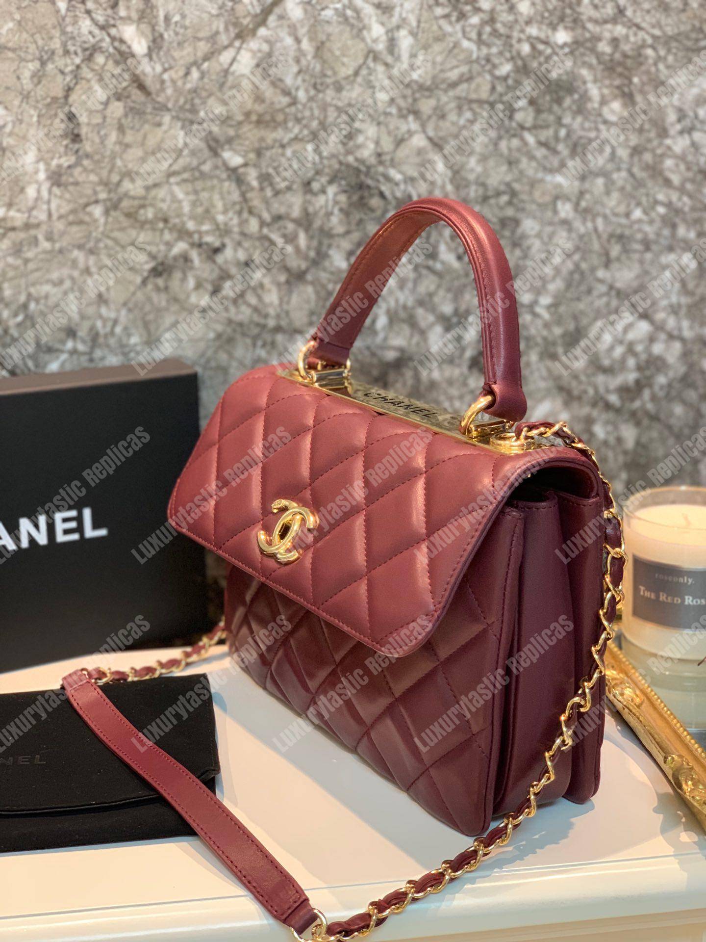 Ch*el small flap bag with top handle burgundy-gold