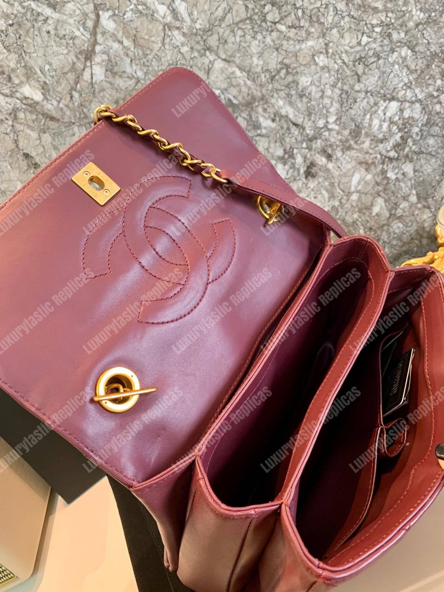 Ch*el small flap bag with top handle burgundy-gold