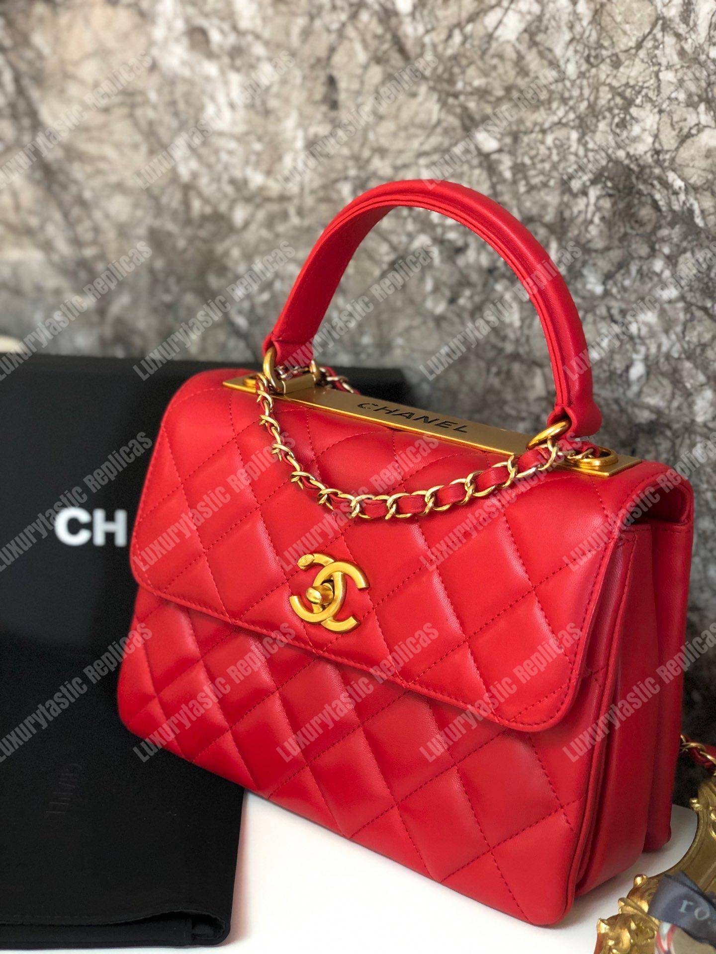 Ch*el small flap bag with top handle red-gold
