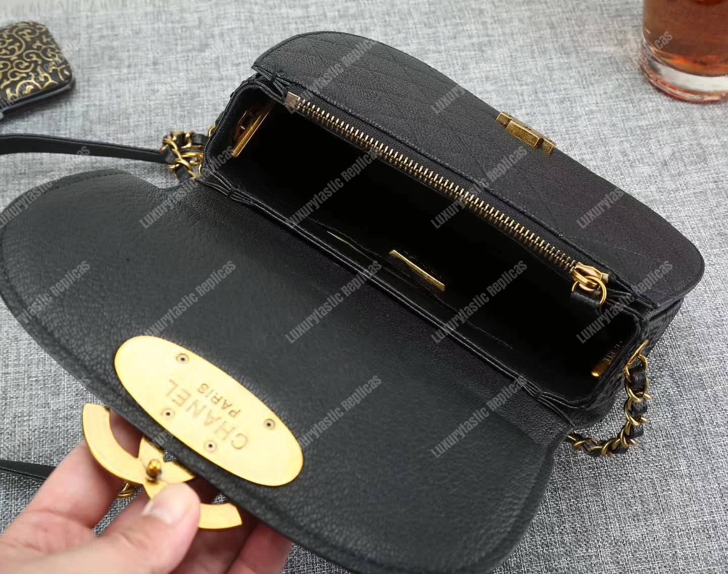 Ch*el medium flap bag with top handle black