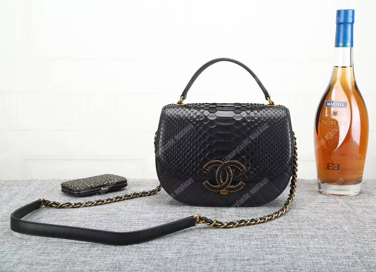Ch*el medium flap bag with top handle black