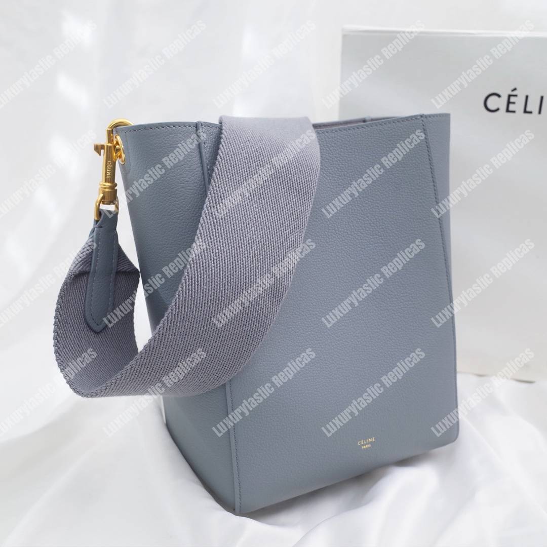 Ce**e sangle small bucket bag in soft grained calfskin cloud