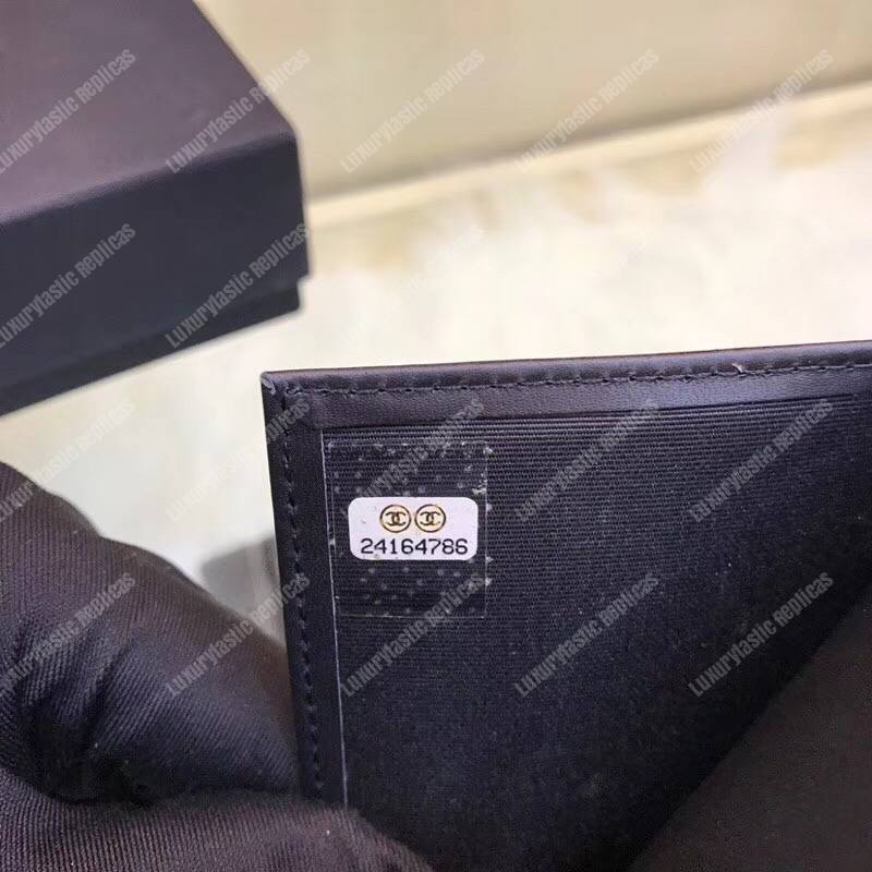 Ch*el boy small flap wallet black