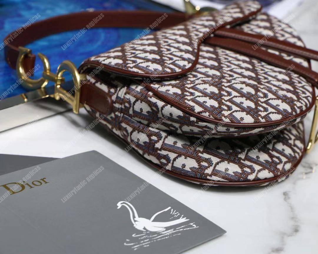 D*or burgundy oblique saddle bag