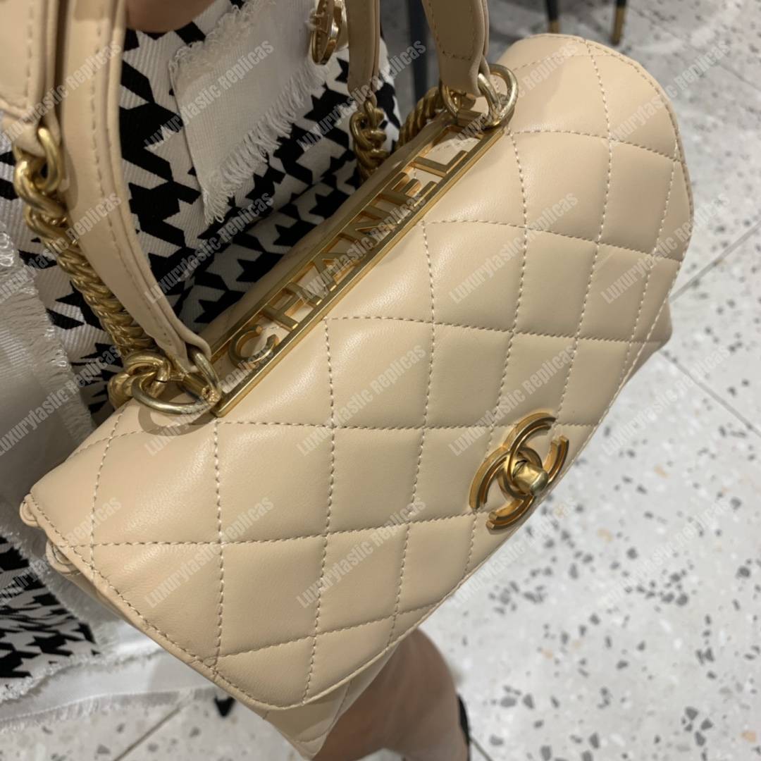 Ch*el flap bag with top handle lambskin beige