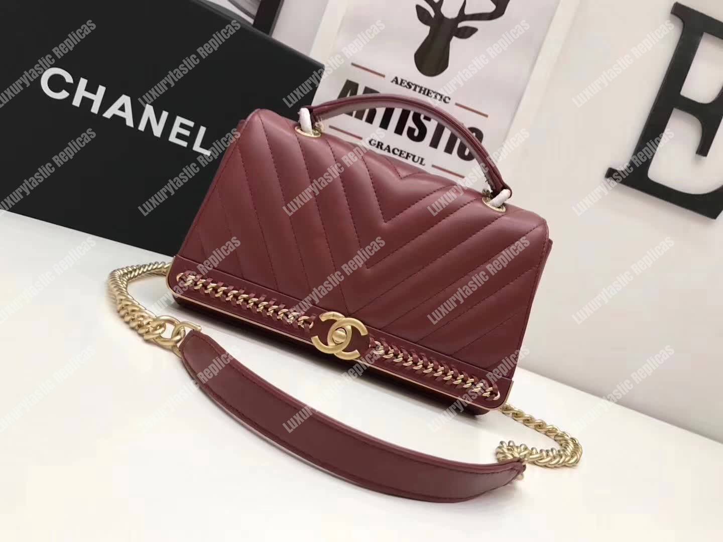 Ch*el chevron stitched chain top handle flap bag red