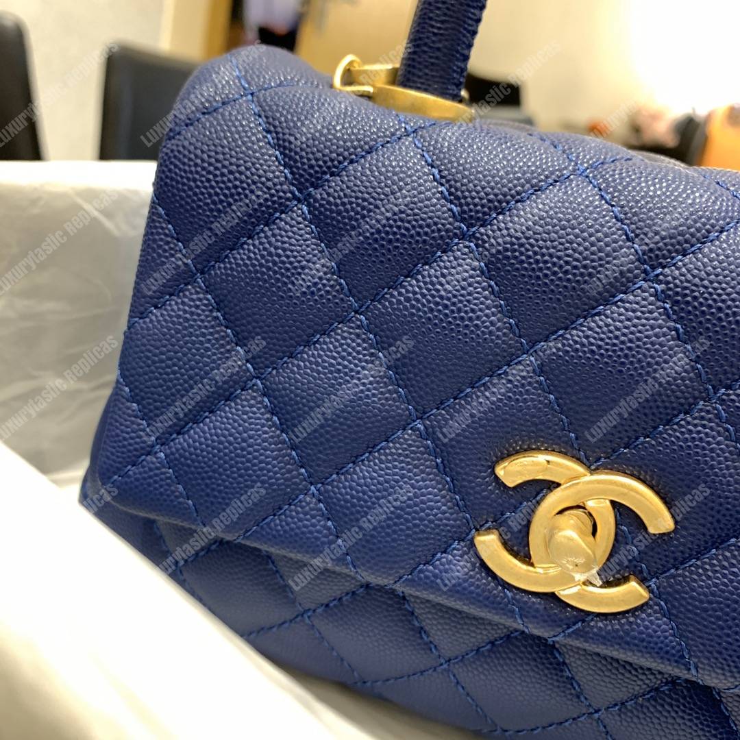 Ch*el flap bag with top handle caviar leather blue