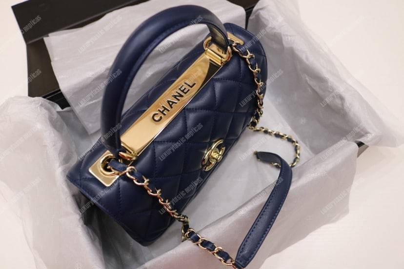 Ch*el small flap bag with top handle navy blue-gold