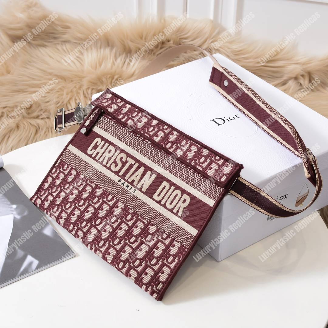 D*or burgundy oblique embroidered canvas clutch