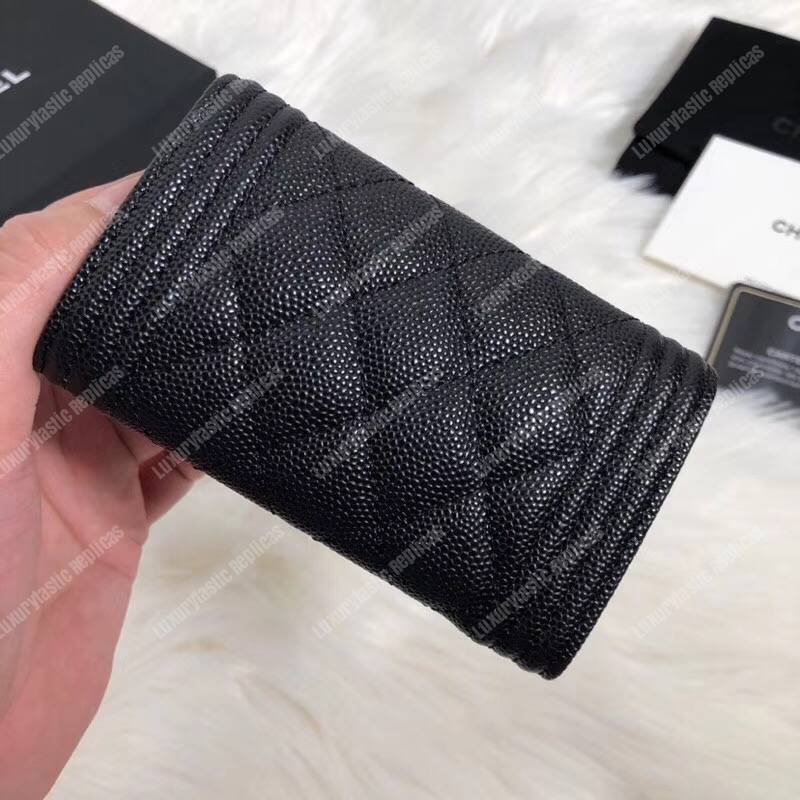 Ch*el boy small flap wallet black