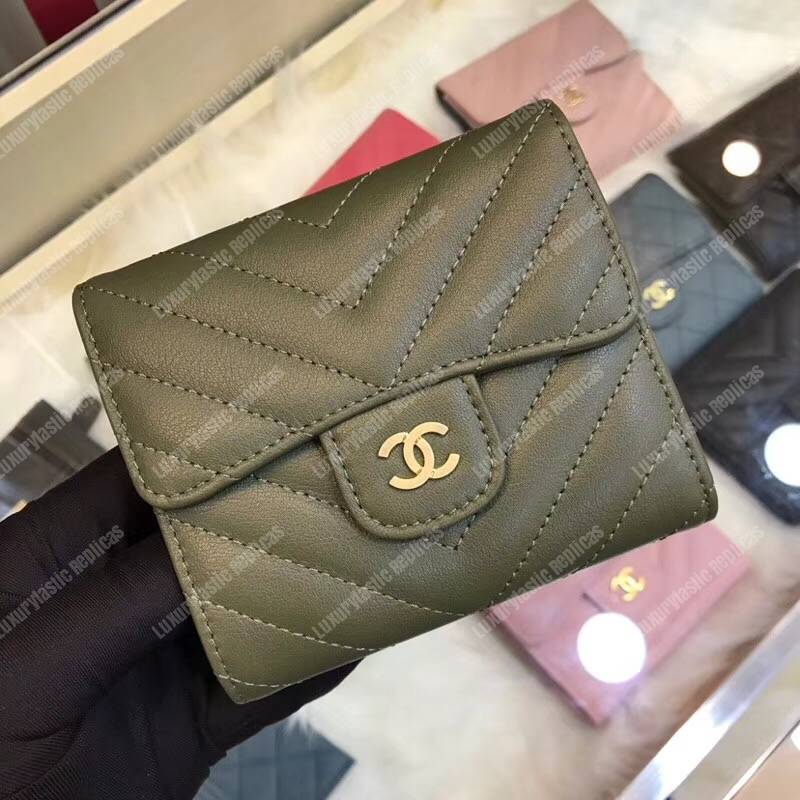 Ch*el classic small flap wallet dark green