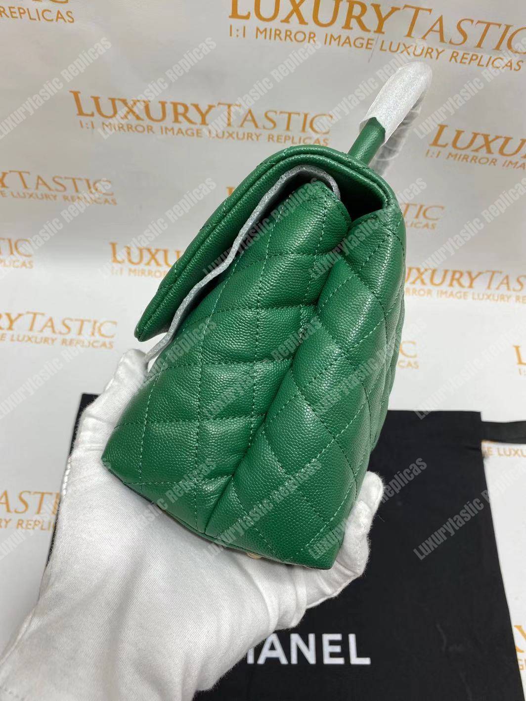 Ch*el flap bag with top handle green