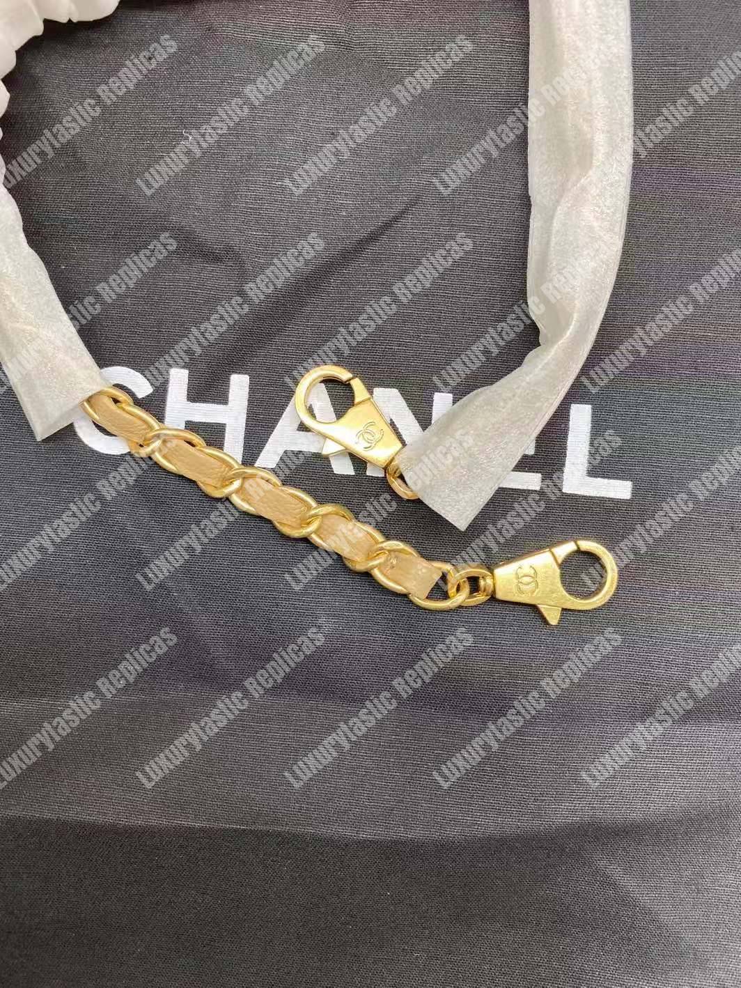 Ch*el flap bag with top handle beige