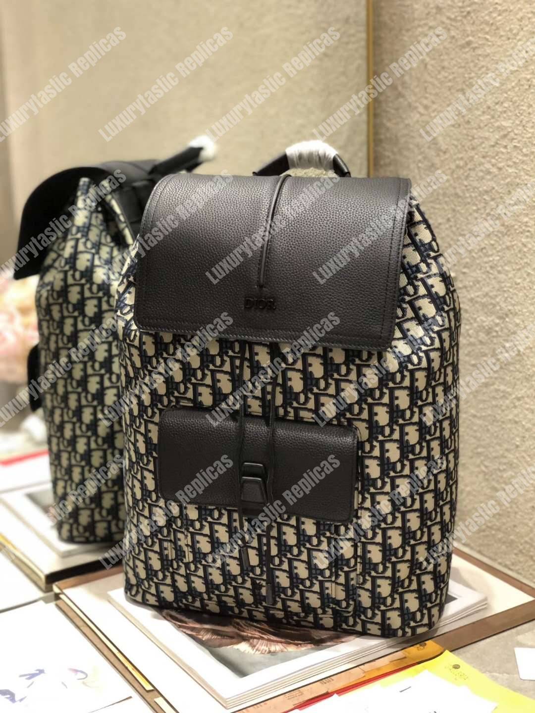 D*or navy blue oblique drawstring motion backpack black/beige