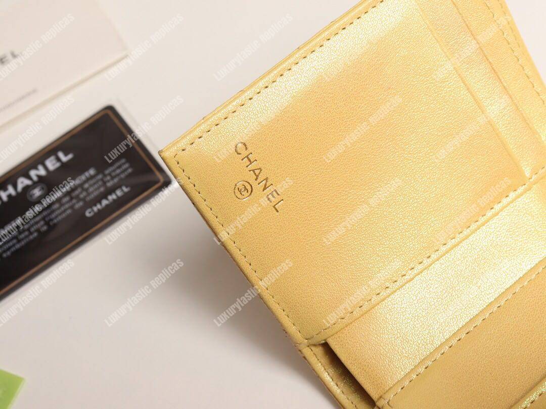 Ch*el classic small flap wallet yellow