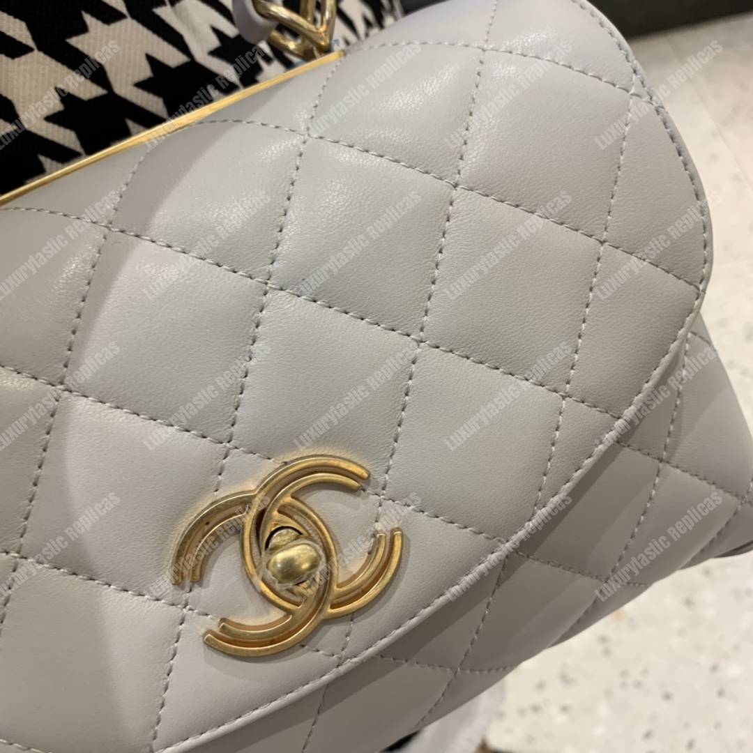 Ch*el flap bag with top handle lambskin white