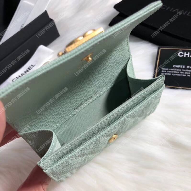 Ch*el boy small flap wallet light green