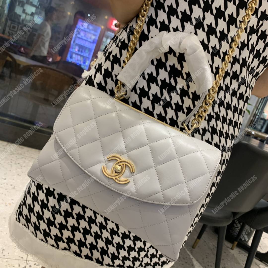 Ch*el flap bag with top handle lambskin white