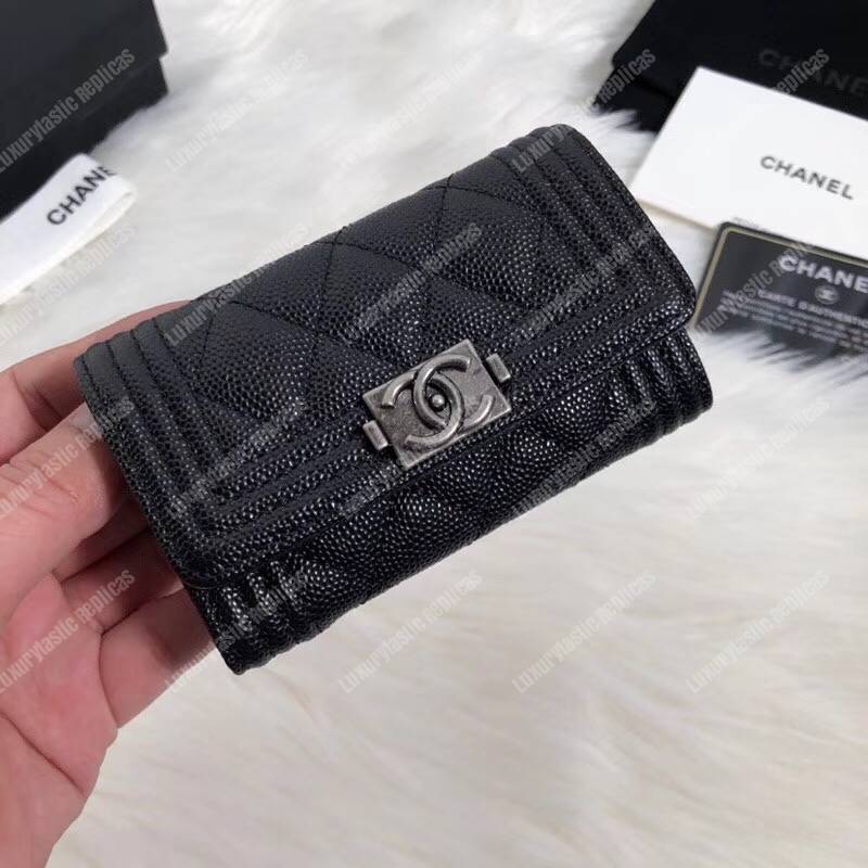 Ch*el boy small flap wallet black