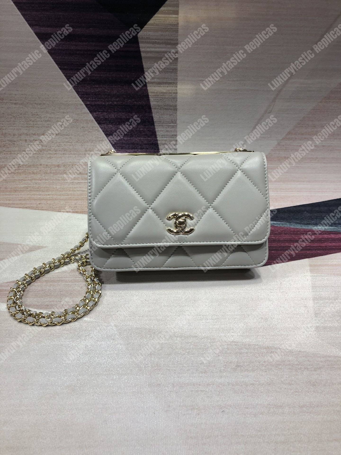 Ch*el wallet on chain – woc lambskin gold-toned metal white