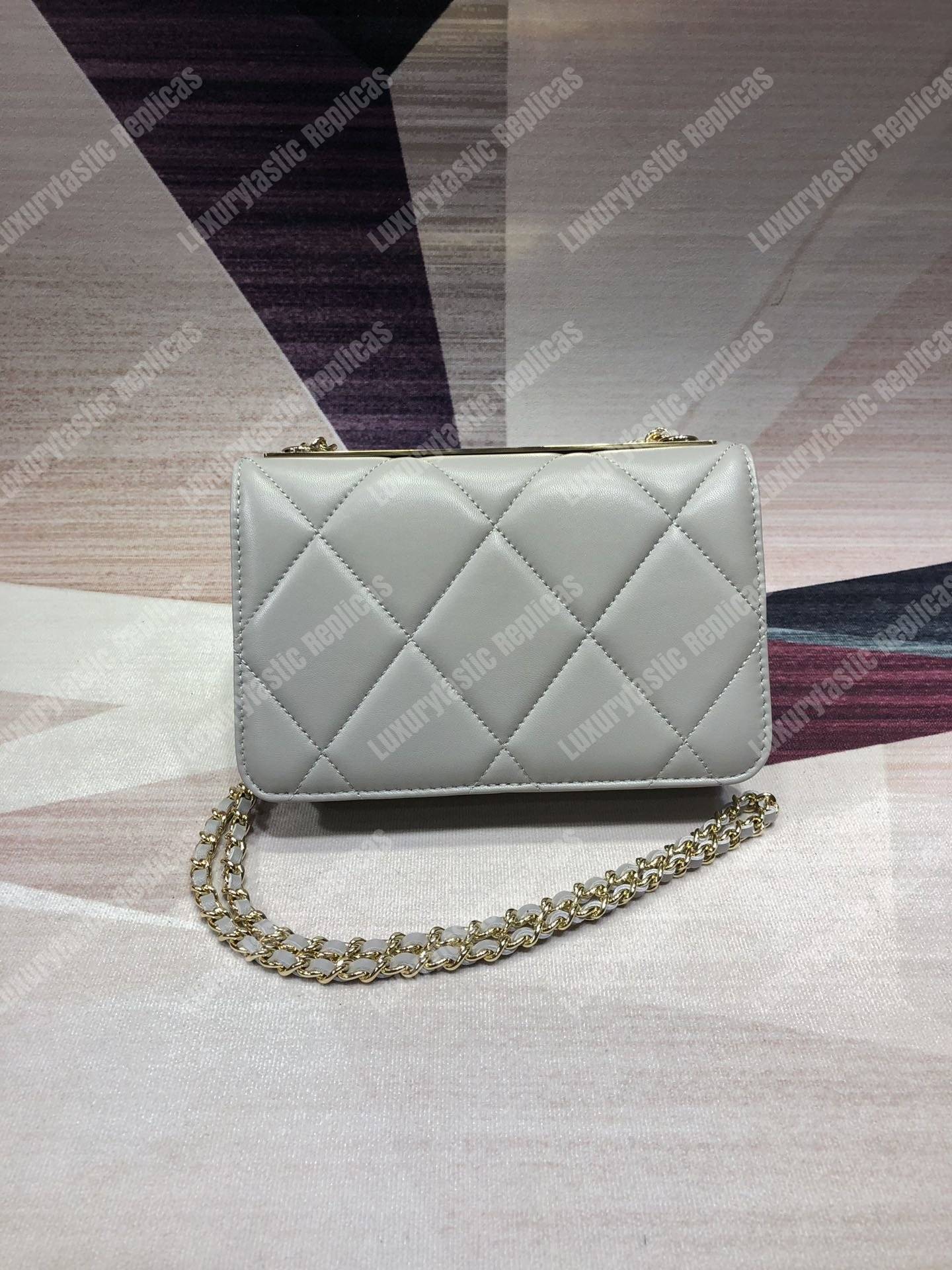 Ch*el wallet on chain – woc lambskin gold-toned metal white