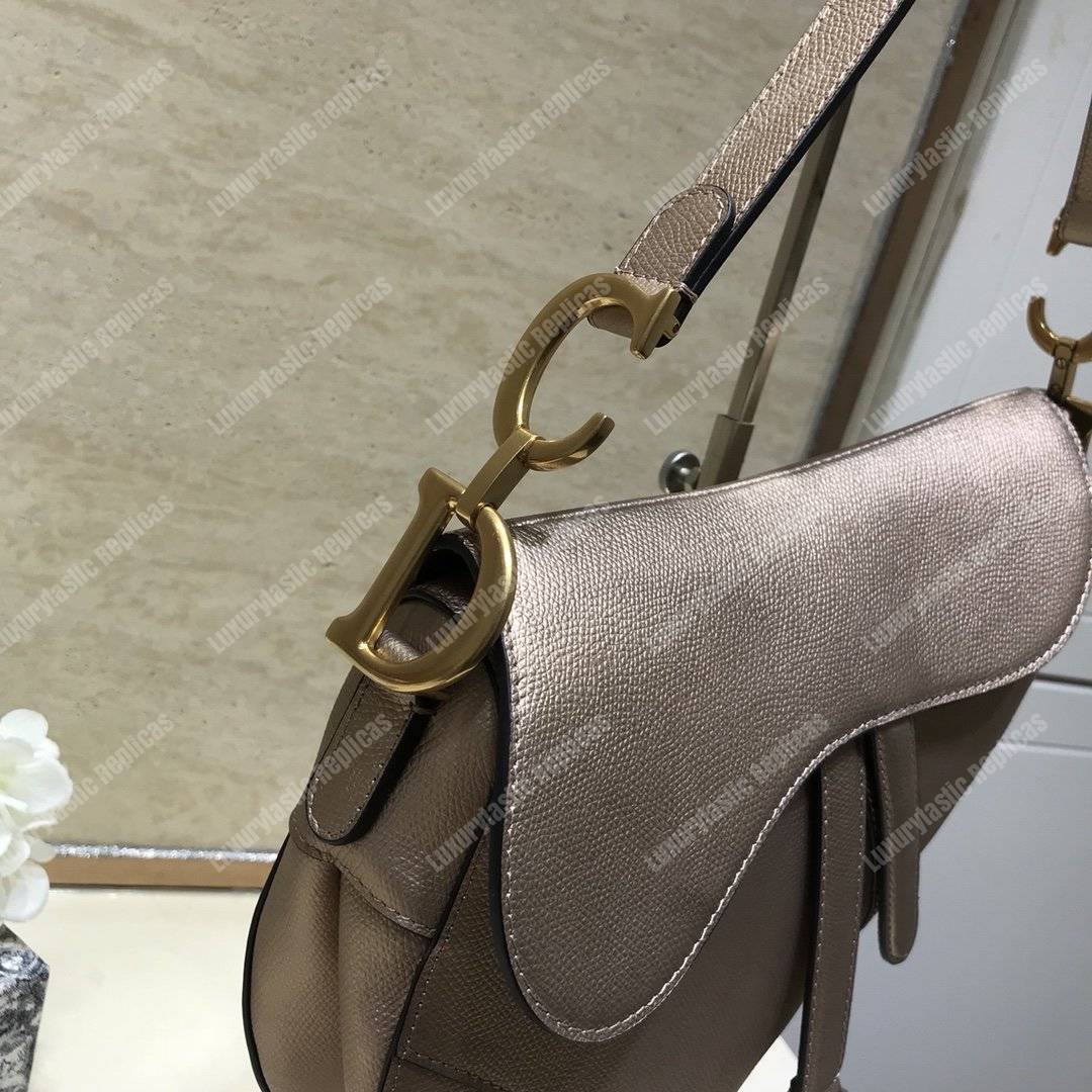 D*or saddle bag in champagne metallic grained calfskin