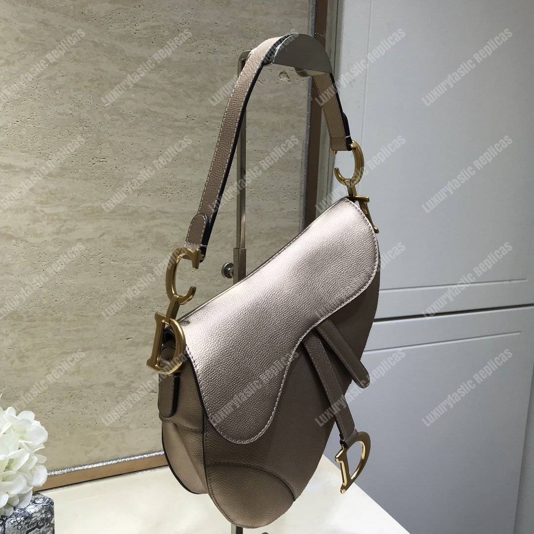 D*or saddle bag in champagne metallic grained calfskin