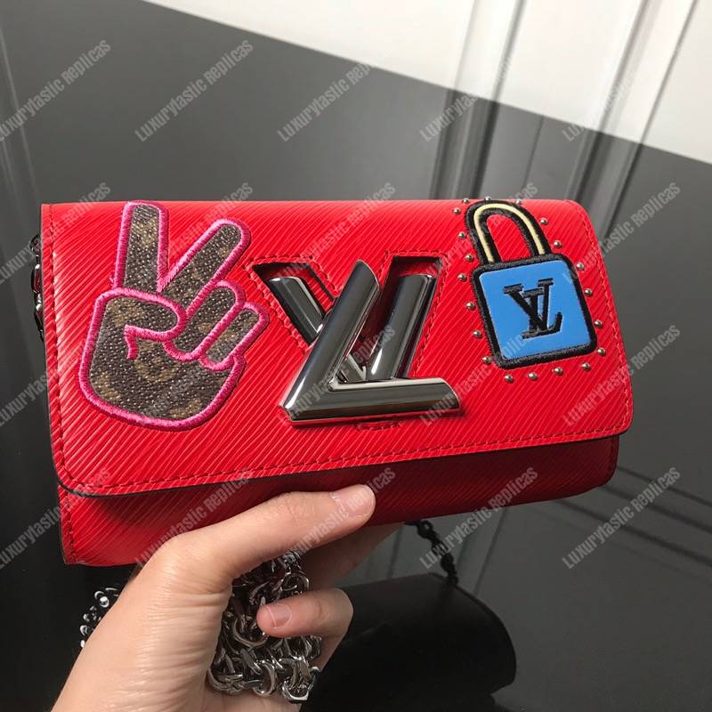 LV Twist Chain Wallet Epi Leather Travel and Trunk-Making Heritage Red